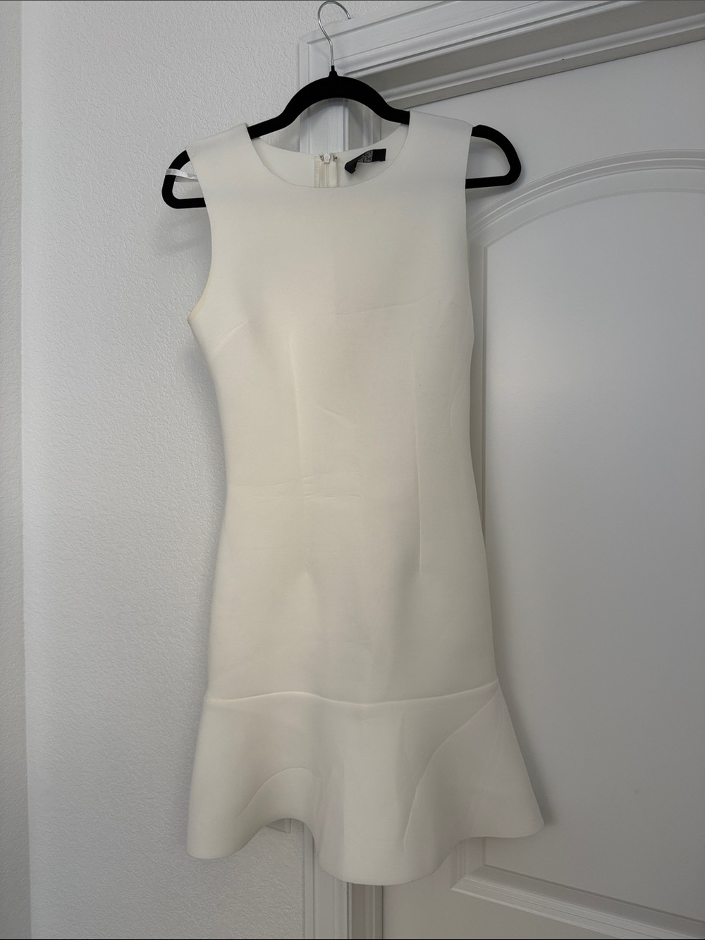 AX Paris White Sleeveless Peplum Hem Dress